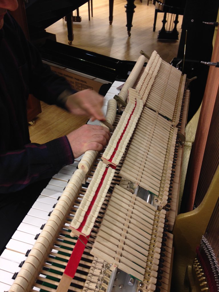 BluthnerUK's tweet photo. Our technician Ivo, shaping the hammers on an #Irmler #uprightpiano . . . #pianotuner #Bluthner #piano #bakerstreet https://t.co/uZDR4Azur7