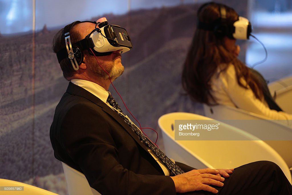 TwoBitCircusVR's tweet image. Attendees watch a synced VR experience at the @wef in Davos, Switzerland - via @GettyImages gettyimages.com/detail/news-ph…