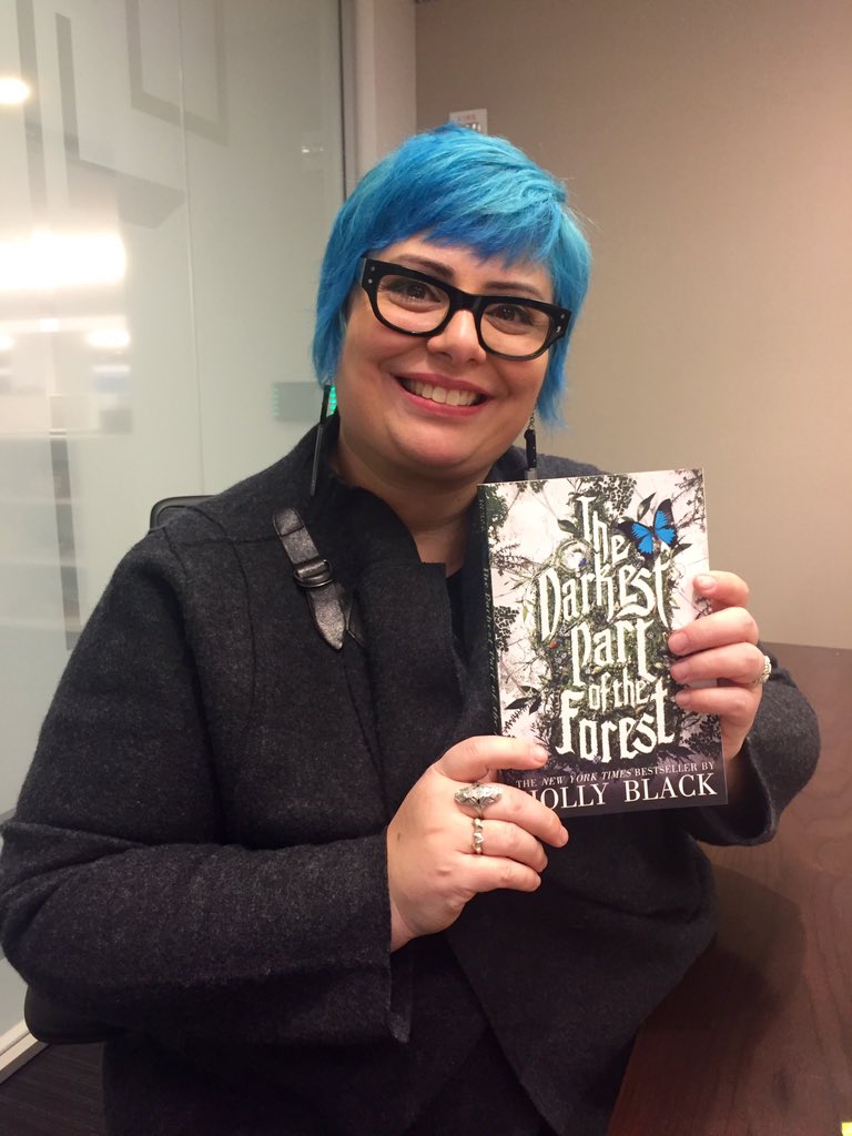 theNOVL's tweet photo. You guys! @hollyblack came to talk #DPotF in a @lbschool podcast and she has the BEST purse ever. We're obsessed! https://t.co/DSCAC2cvpt