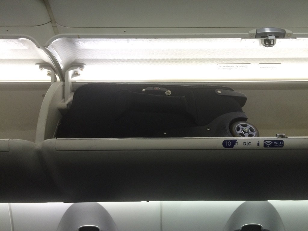 toddowyoung's tweet photo. Small regional jet. They said roller bag wouldn't fit in overhead. @thinkTANKphoto Airport Int'l fits like a champ. https://t.co/IouQRMa8LU