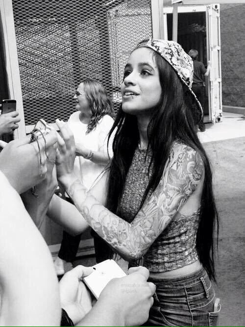 snap backs and tattoos