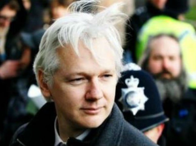 timesofindia's tweet photo. Julian Assange to be questioned at London hideout. Full report: https://t.co/ft9JzEsPxS https://t.co/nlG939Eyke