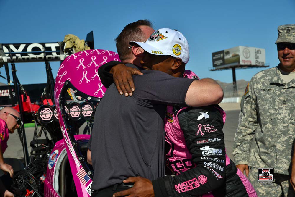 TedYerzyk's tweet photo. #NationalHugDay with @AntronBrown @LVMSStrip. #ChampTron #NHRA #NHRAOnFOX https://t.co/D1PQGDw8k1