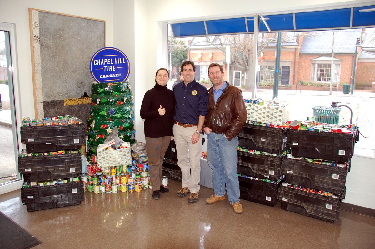 IFCforSS's tweet image. Michael Reinke, @CORAFoodPantry and Marc Pons with 2,000+ canned food drive! IFC thanks @ChapelHillTire customers!