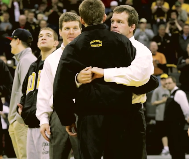 FloWrestling's tweet photo. Wrestlers prove there’s no wrong way to hug!  Happy #NationalHugDay https://t.co/ZQI6h1lnXF