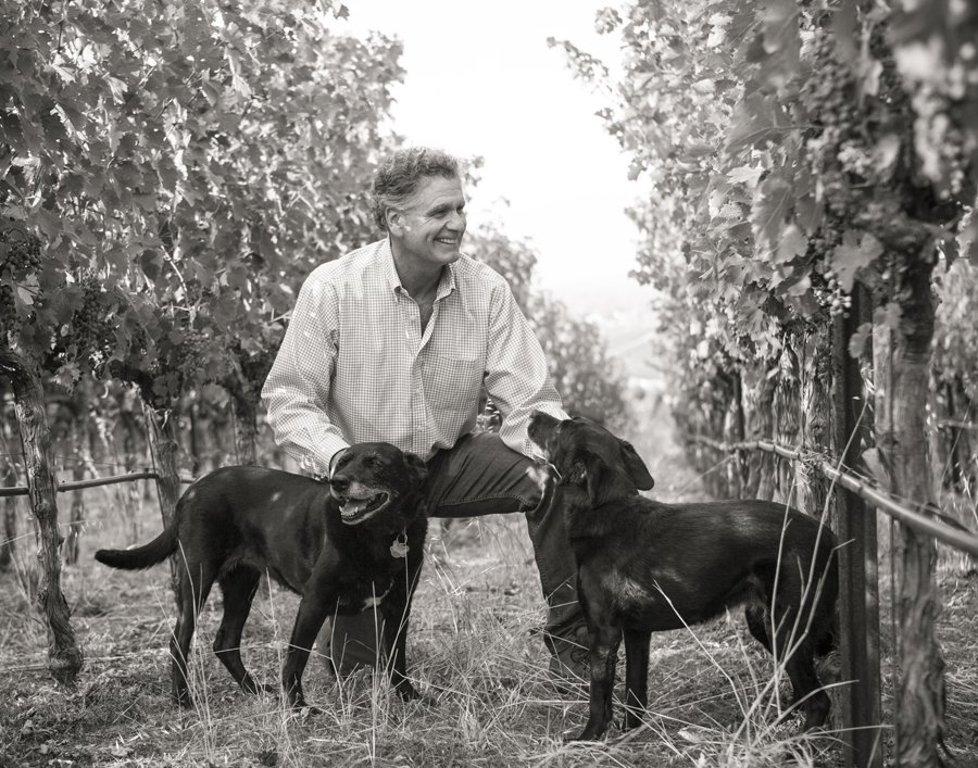 Great picture of our winemaker, Patrick Mahaney, with his vineyard dogs!