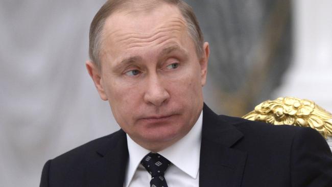 australian's tweet image. ‘Pedophile Putin’: the claim that may have got a former spy killed. bit.ly/1JmXCxt