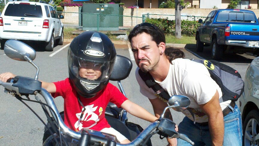 TheWeirdTeacher's tweet photo. #tbt to when I was teaching in Hawaii and the librarian's younger son asked to sit on my motorcycle. #bikerface https://t.co/pNmve2nGKz