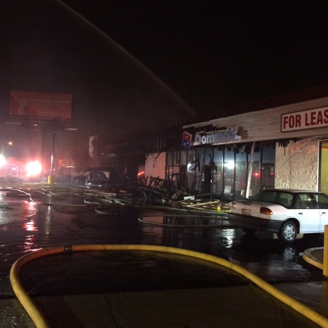 LAFDtalk's tweet photo. #Kockdown of multiple units in strip mall heavily damaged from non-injury, late night fire in #BoyleHeights https://t.co/I4DfE4sn0b