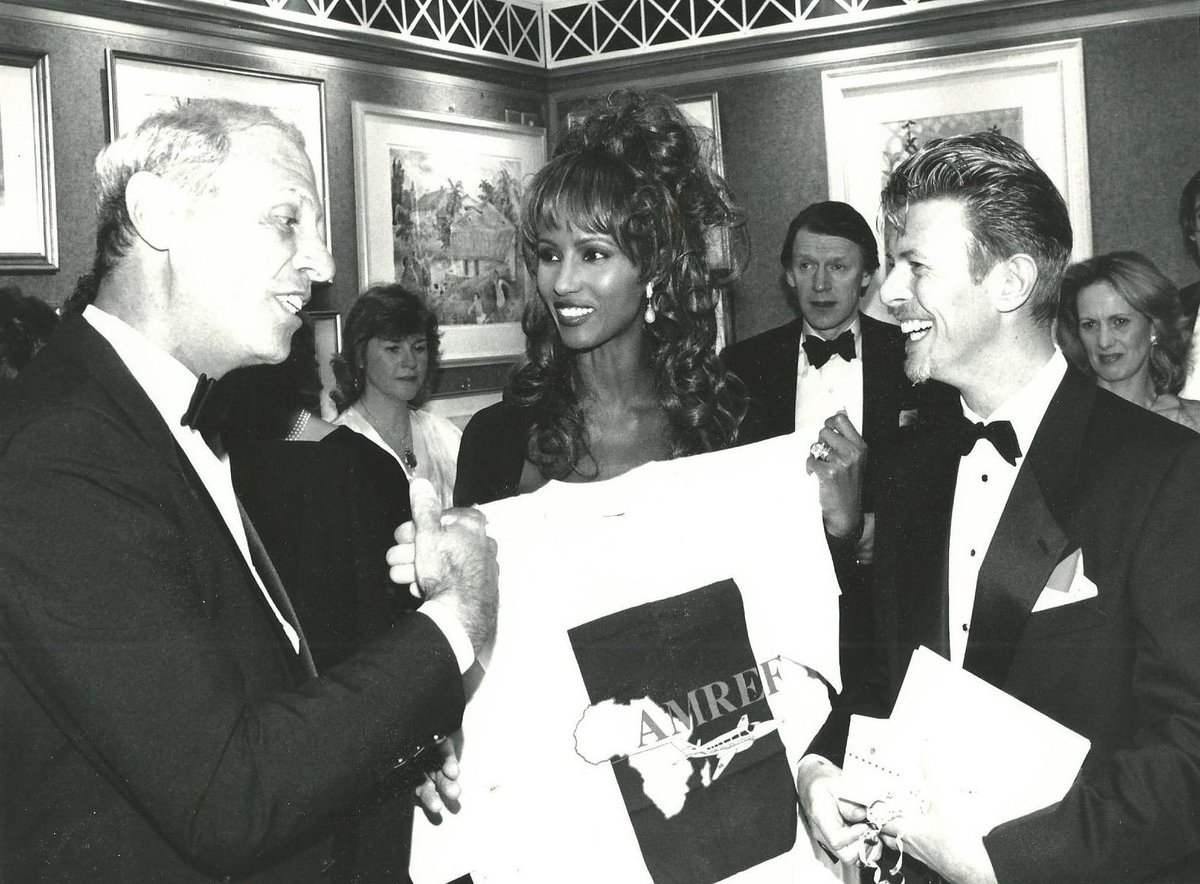 Amref_UK's tweet image. Thrilled to find this photo of Iman &amp;amp; David #Bowie at one of our events in 1993, supporting our work across #Africa
