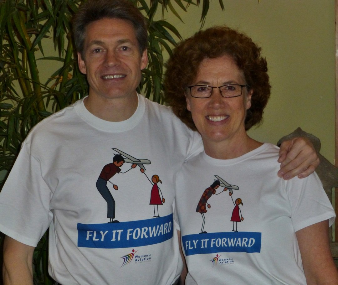 WomenOfAviation's tweet photo. His &amp; hers. Get your #FlyItForward tshirt today. It could be free for iWOAW #VIPClubMembers who redeem their points. https://t.co/mMkEL5h0Nm