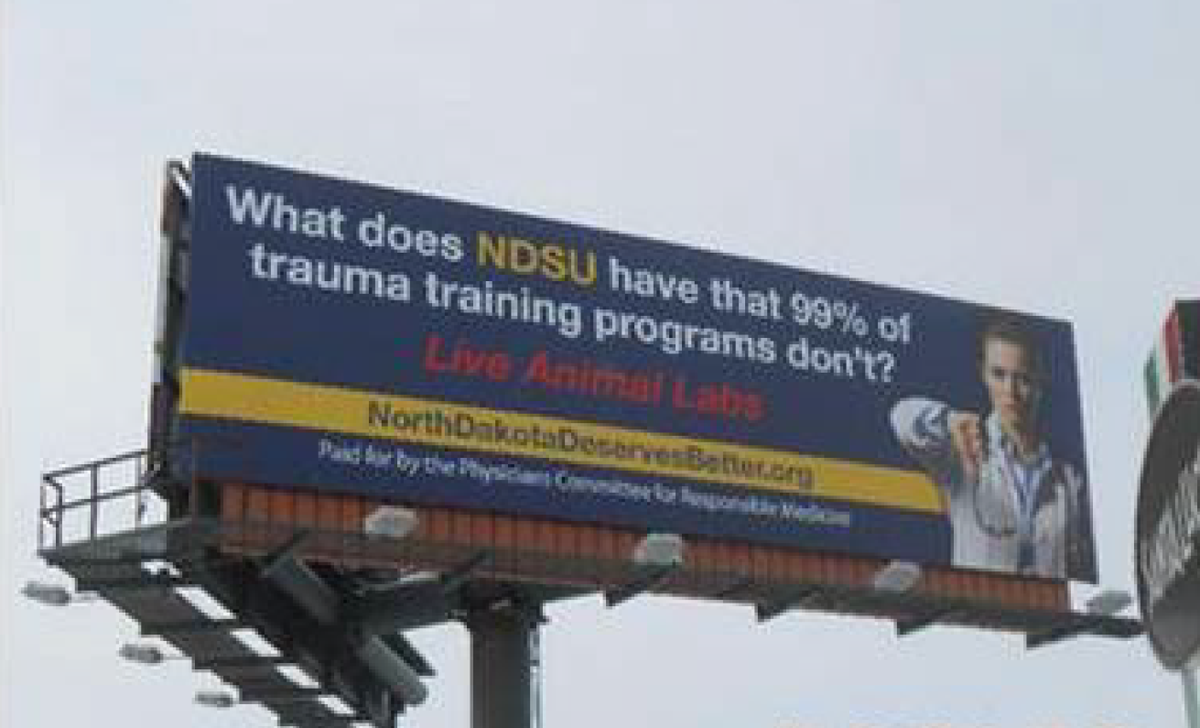 PCRM's tweet photo. We put up ads surrounding @NDSU, asking to join the 99% and end the animal lab. @Valleynews https://t.co/UbqsWaf0dk https://t.co/pcRBYqMCFC