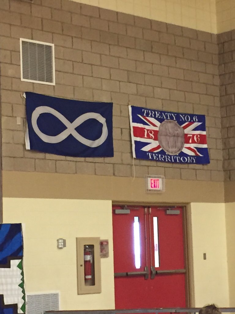 NPWschool's tweet photo. Our 6/7 class and honoured guests helped us dedicate the Treaty 6 and Metis flags.Proud day! #NPWschool #spslearn https://t.co/KWpHINWOoG