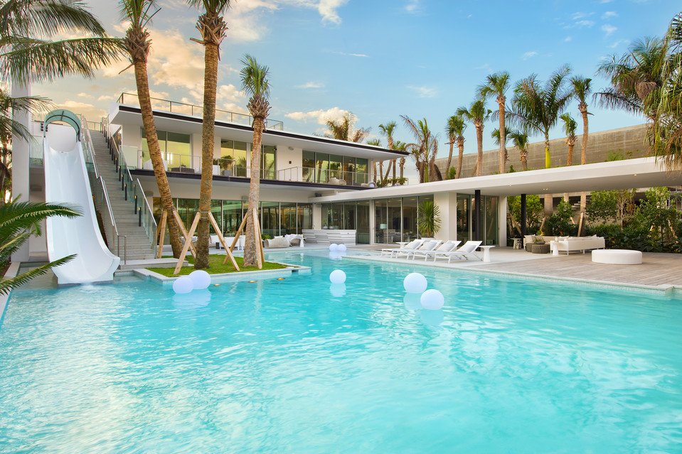 AddressReport's tweet image. What a $34M Miami Beach home looks like (when there's a water slide) wsj.com/articles/miami… #luxuryrealestate