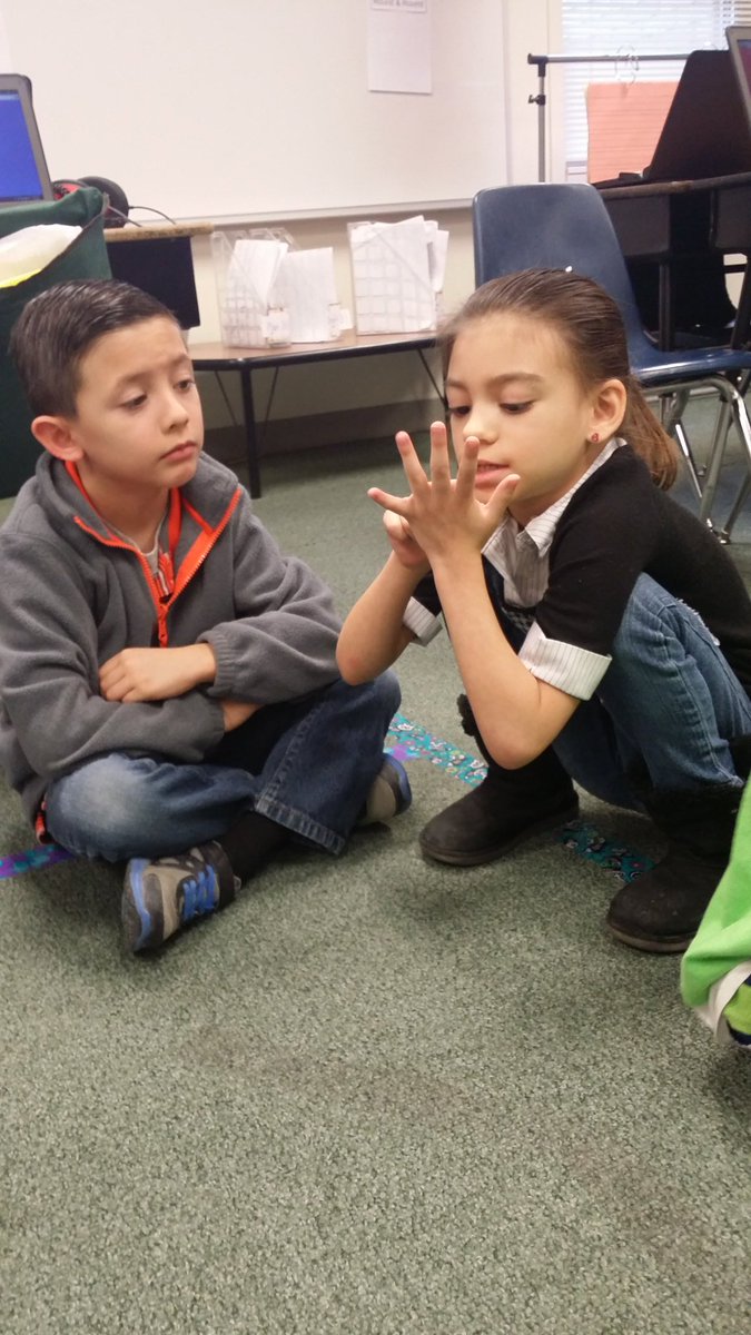 ladyjcreates's tweet photo. Students using their hand to retell a story to their partner. https://t.co/ZrwFGFaXYb