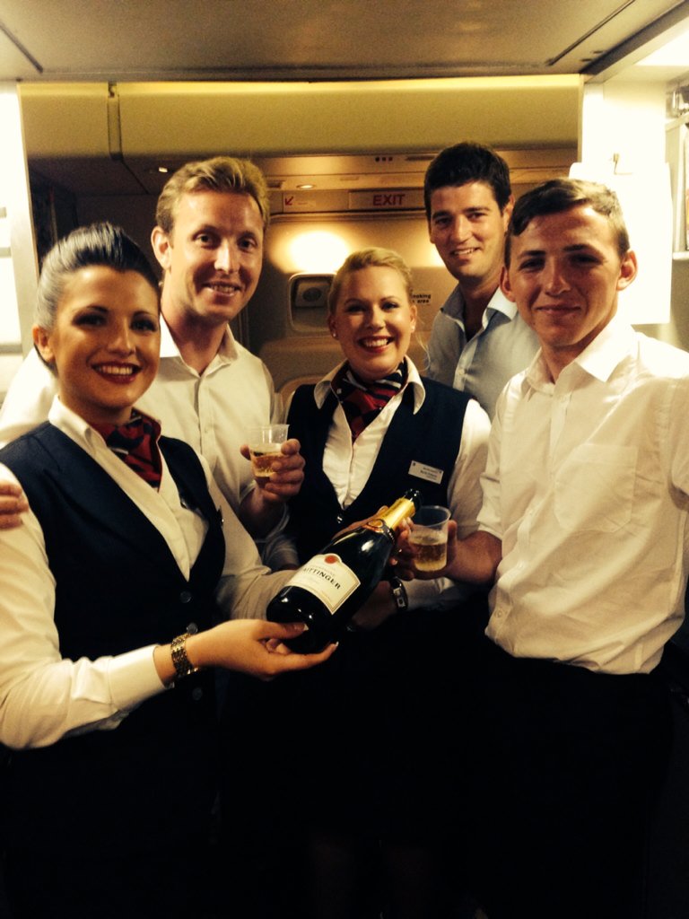 GuardsCricket's tweet photo. @British_Airways take us home after a wonderful fortnight in SA. Trooper Mathews, HCR, has a final glass of fizz. https://t.co/755KjbXUGK
