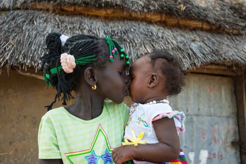 A sister's love. Nyayaiw, 6, meets baby Nyagua for first time after being reunified with her mother <a href="/unicefssudan/">UNICEF South Sudan</a>