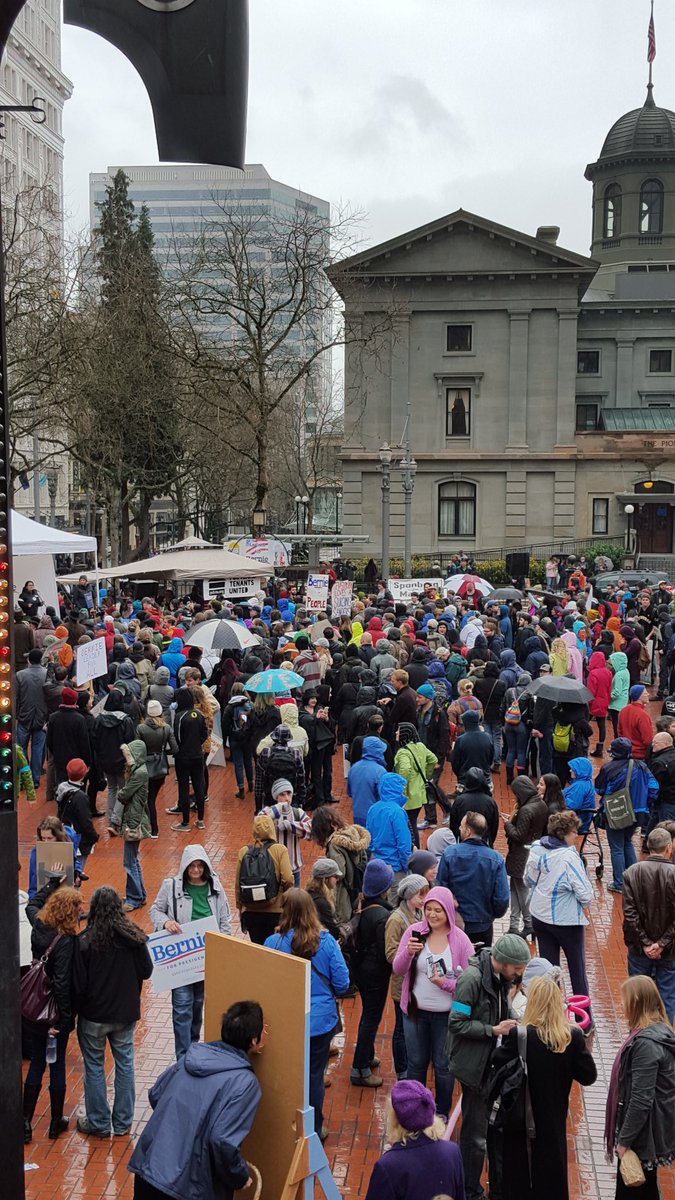 PegHelgerson's tweet photo. It may be raining in Portland but these people #FeelTheBern  At #MarchForBernie   #Bernie2016 https://t.co/7tDTLZWMHr