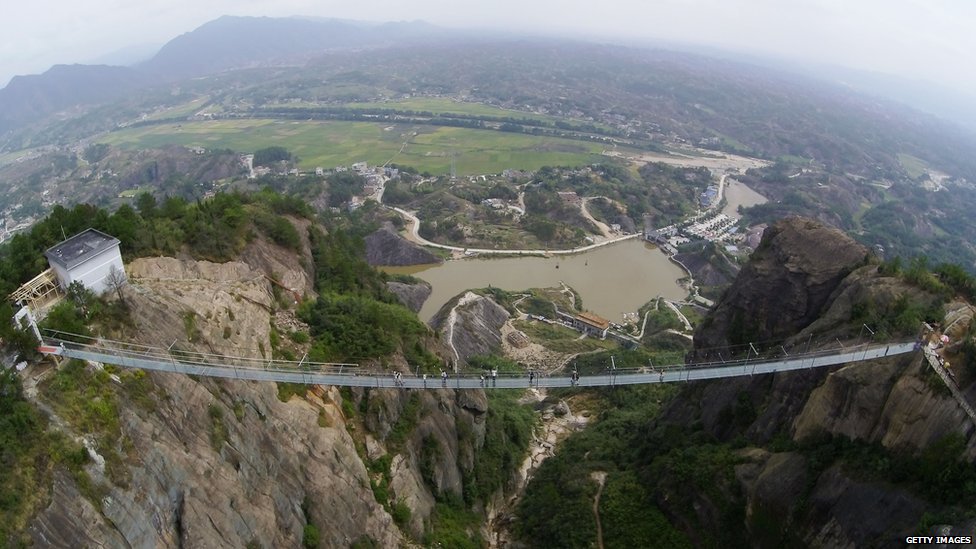 BBCWorld's tweet photo. Don't. Look. Down 😳.... Do you dare cross China's glass-bottomed bridges? (via @heathrchen) https://t.co/0Fo7H3KY75 https://t.co/xNSiW38deo