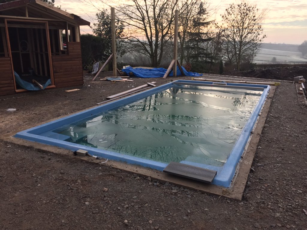 MySpaUK's tweet image. Concrete ringbeam installed and plant room/summer house going up. Taking shape. #MySpaPools #CompassPools #swimming