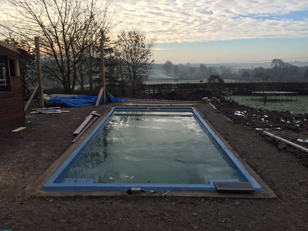 MySpaUK's tweet image. Concrete ringbeam installed and plant room/summer house going up. Taking shape. #MySpaPools #CompassPools #swimming