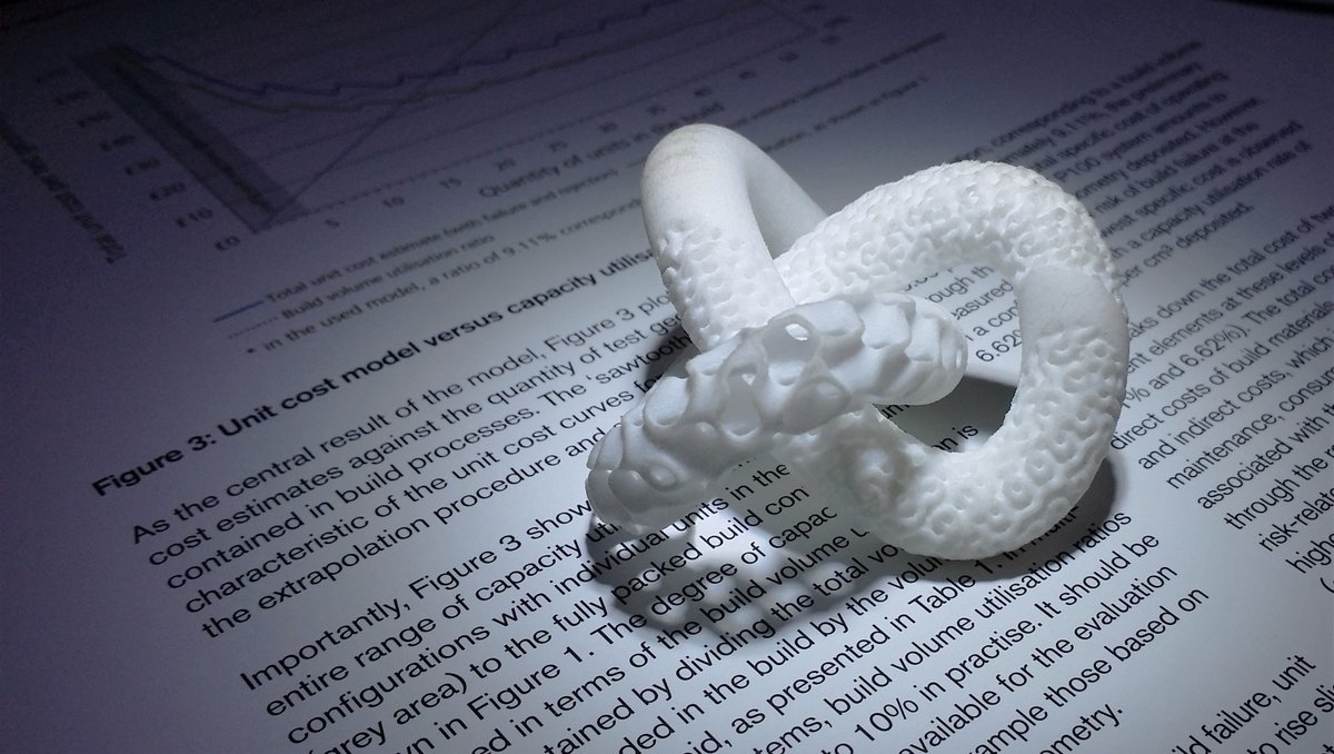 AddManMan's tweet image. Playing around with phone and LED... Yes, it&apos;s a torus knot made via #3DPrinting on random text