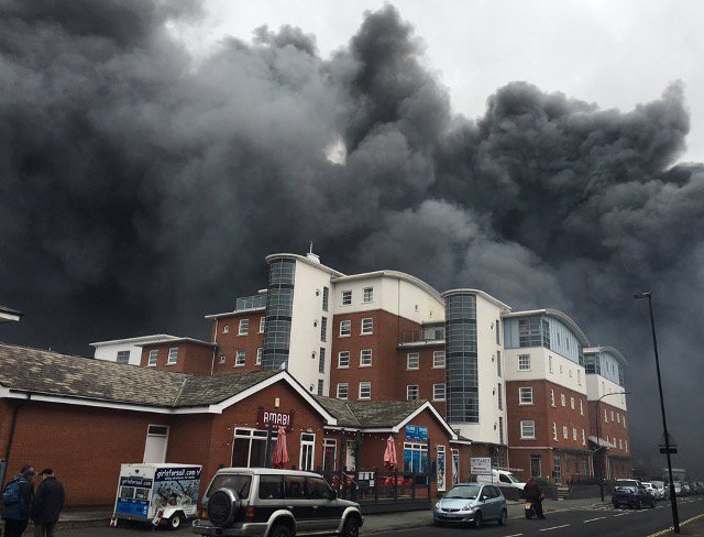 Large incident reported at a boat yard in Cowes ,on the Isle Of Wight now. Smoke visible from Hampshire