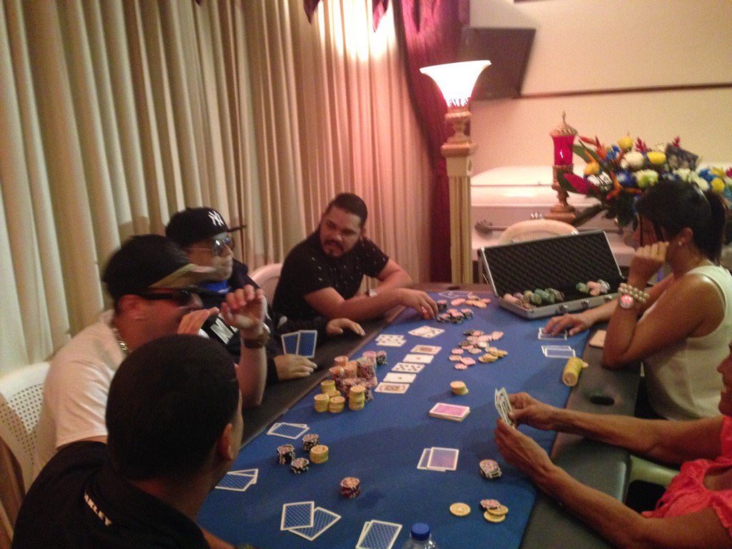 IndianaKC's tweet photo. This guy funeral is in a poker table and family and friends playing poker #uniquefuneral #PuertoRico https://t.co/y6TBQFXgjF