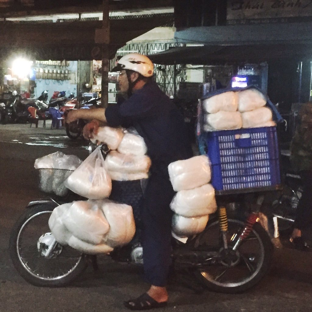 Early morning noodle delivery, Saigon, Vietnam