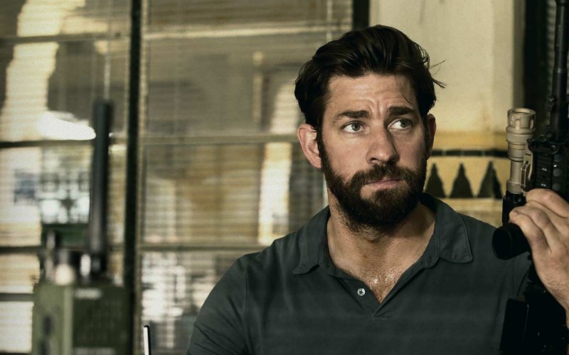 John krasinski criticizes politicians for using '13 hours' as a
