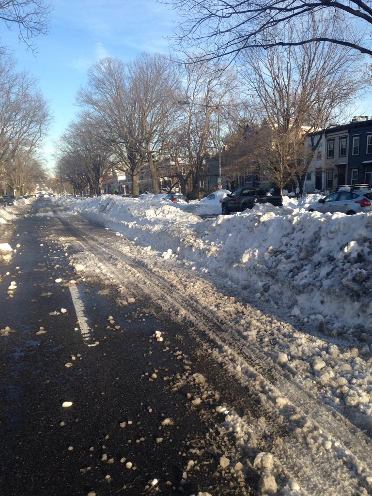 MorganYarnoff's tweet photo. Some joker in SUV just drove down 1200 blk Maryland Ave NE along median knocking plowed snow into the st #Snowzilla https://t.co/mE4J0gQFZi