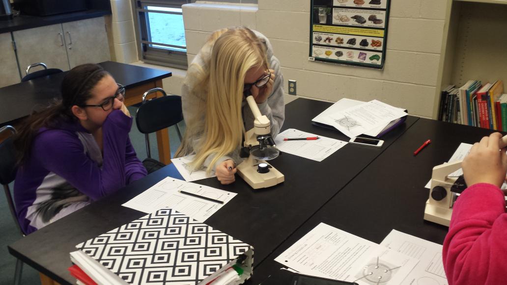 wcr2middle's tweet photo. Last Friday was 8th grade pajama day.  Pajamas and microscopes were on display in Mr. Aaron's room. https://t.co/OavyJ2JuH9