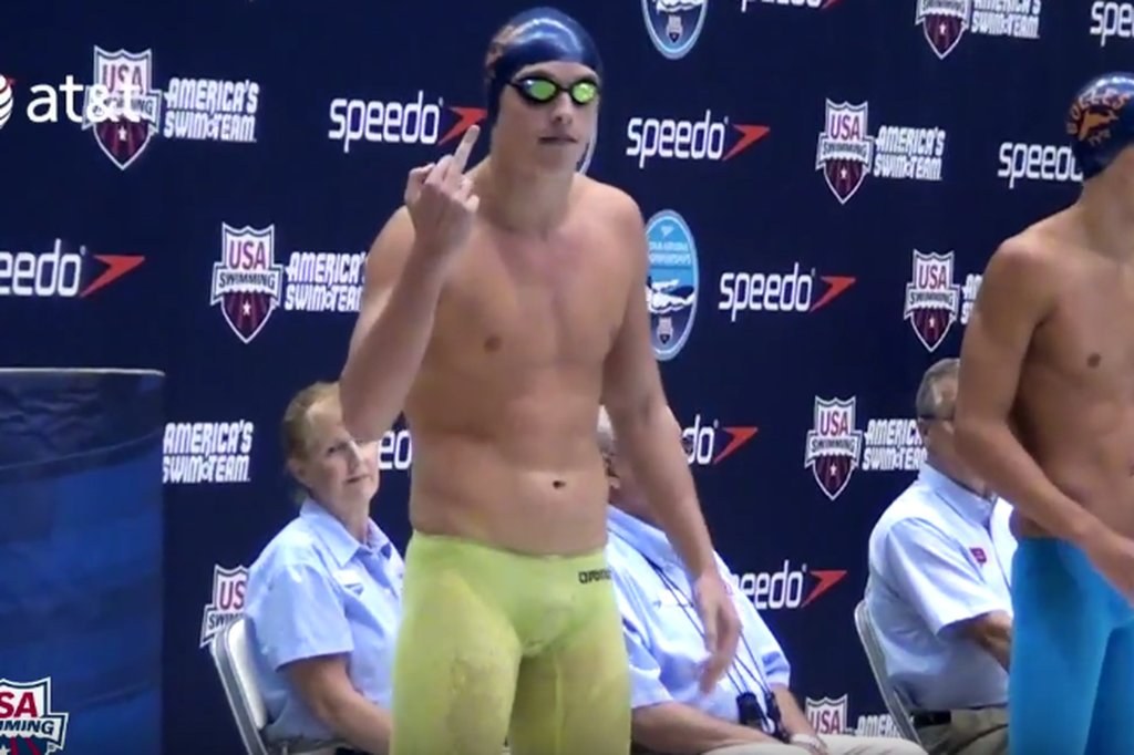 rhutthormer's tweet image. Swimmer Santo Condorelli flips the middle finger to his dad for good luck before every race …