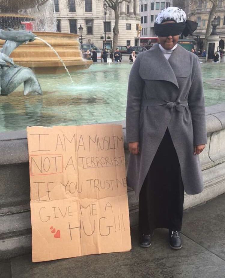 Jprz1321's tweet photo. A Muslim girl tells the people of London that she's not a terrorist and asks for a hug if they trust her https://t.co/oKbnJzYhMY