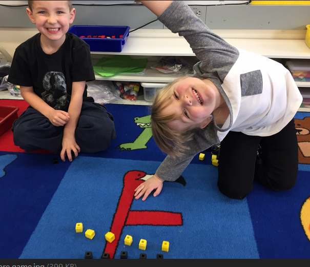 BCSDGinther's tweet image. Miss Armstrong&apos;s K students work in pairs to find one more than a given number.  #KMath