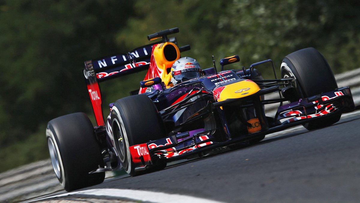 redbullracing's tweet photo. It is of course the 2013 RB9 🙌 Shout out to @Citizen_Toby, first to name the #RetroBull. Here it is in action. #F1 https://t.co/QIpI9lXy60