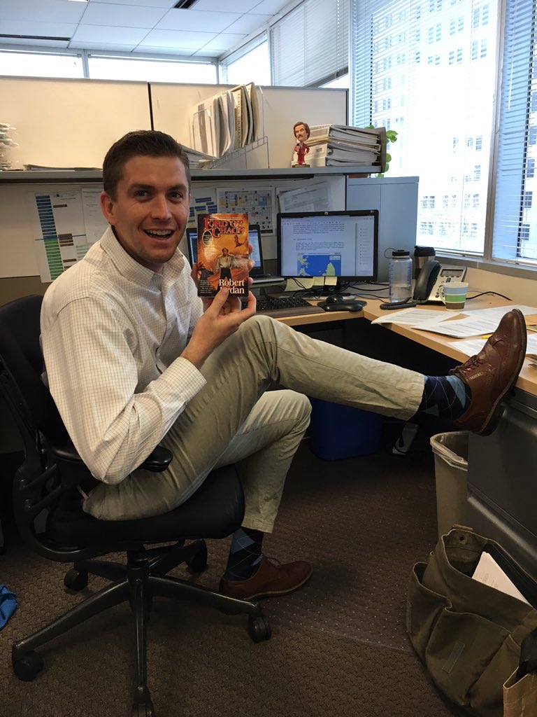 officepals's tweet photo. Matt is SUPER excited to read the Lord of Chaos, Volume VI in The Wheel of Time series #howtobecool #thosesockstho https://t.co/E45XopJy1N