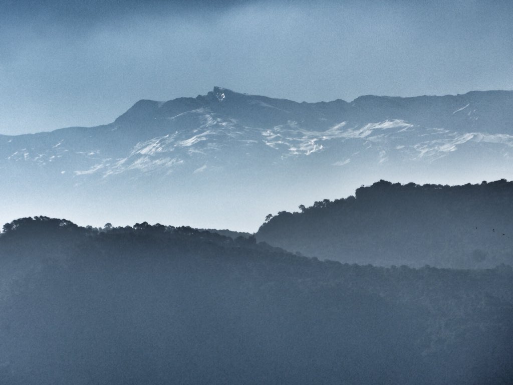 Veleta appearing from the haze. Taken from the Sierra de Huetor yesterday #SierraNevada