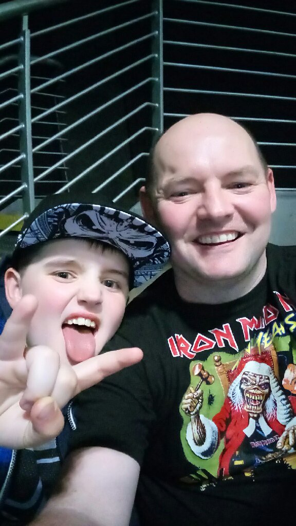 HazelWyllie's tweet image. Fraser ready to rock it out at Iron Maiden gig with his dad 🤘@MissRoss_5