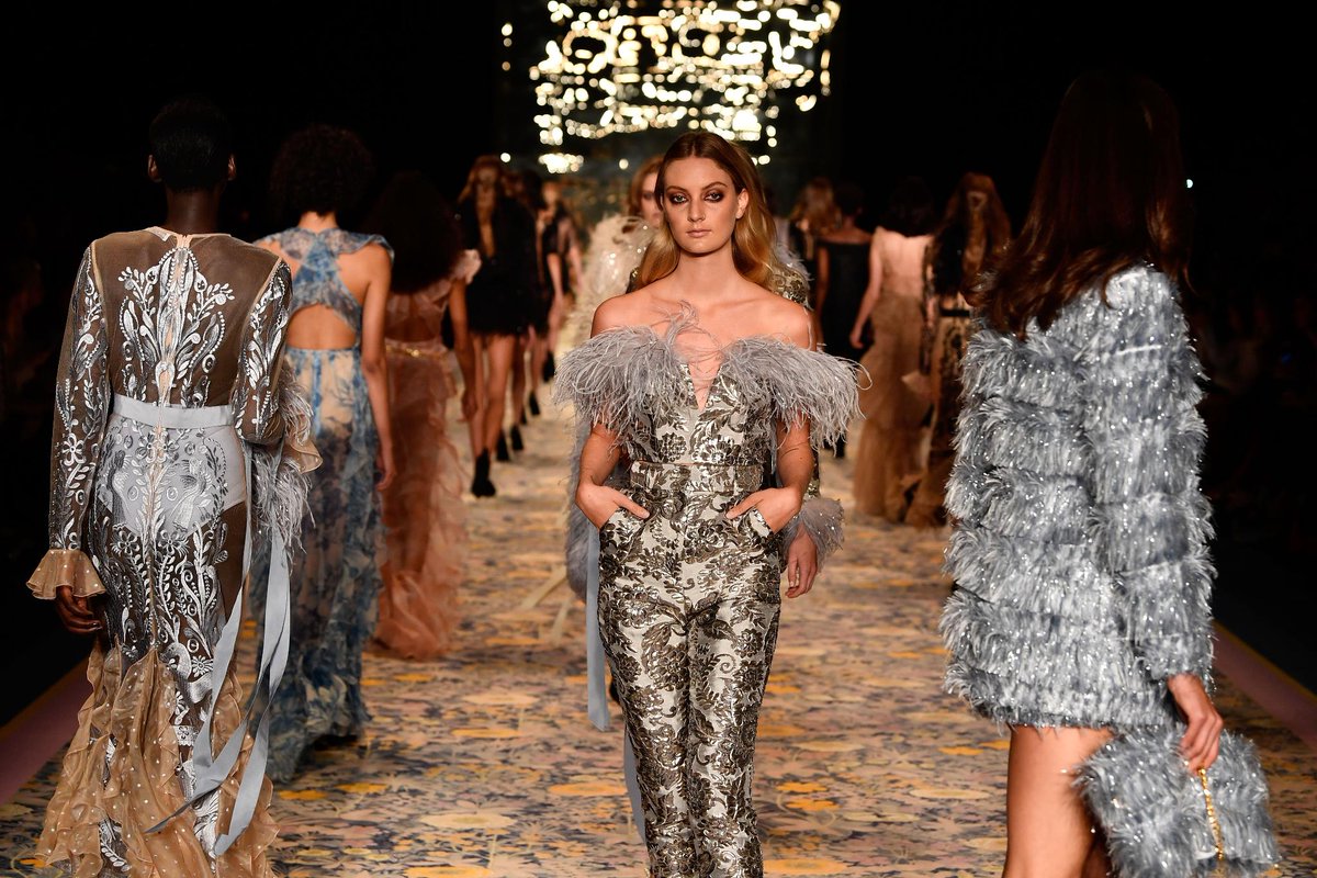 FashionWeek's tweet image. Feathered flair and lots of shimmer on the Alice Mccall runway at @FashionWeekAus. #FashionWeek #MBFWA