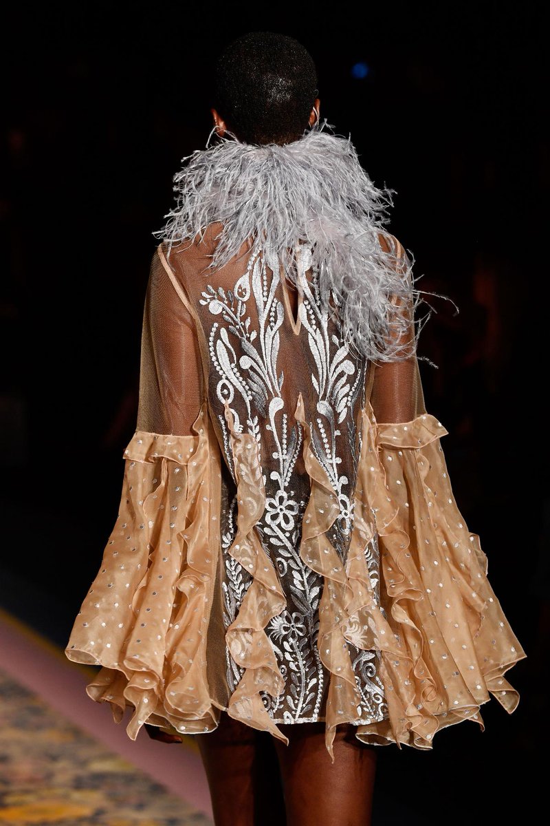 FashionWeek's tweet image. Feathered flair and lots of shimmer on the Alice Mccall runway at @FashionWeekAus. #FashionWeek #MBFWA