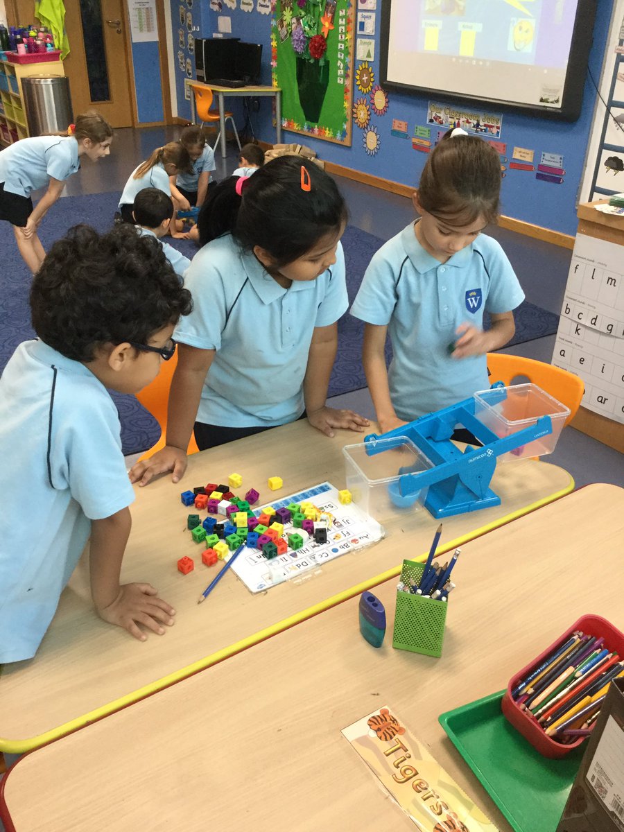 WSO_Year1's tweet photo. In 1D we are using cubes and non standard units to measure the weight of different objects using balances! #year1 #maths #1D 😃 https://t.co/JFPl4VBE5a