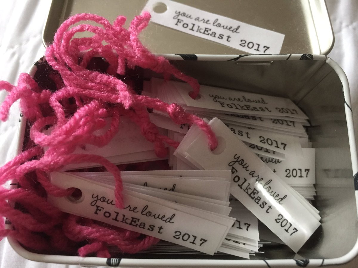 SocialKnitworkS's tweet photo. The @SocialKnitworkS girls have been busy. Tags all ready but what colour will the hearts be @FolkEast this year? https://t.co/ubJw3Bk1gq