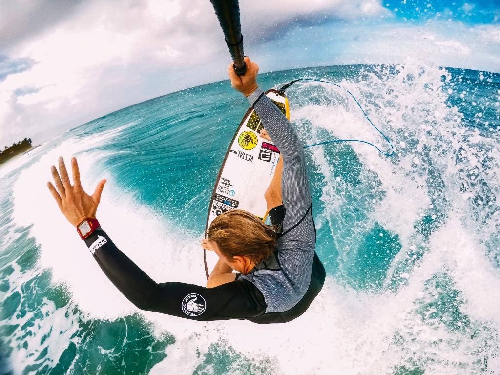 GoPro's tweet photo. Photo of the Day: Jamie O'Brian mounted his #HERO5 to the end of El Grande + triggered it using #GoProRemo - "GoPro, shoot burst!" https://t.co/QccpnbxfO3