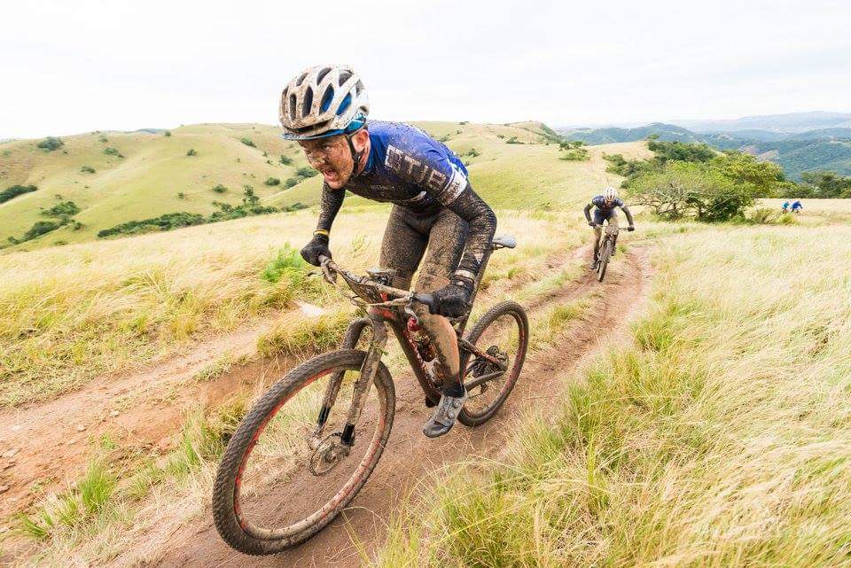 Andrewhillracin's tweet photo. Driving the pace on the bike in some tough conditions at this year's sani2c. The rain slowed but the mud got thicker. #teamTIB #BRA_KZN https://t.co/Ugq7aXM4NX