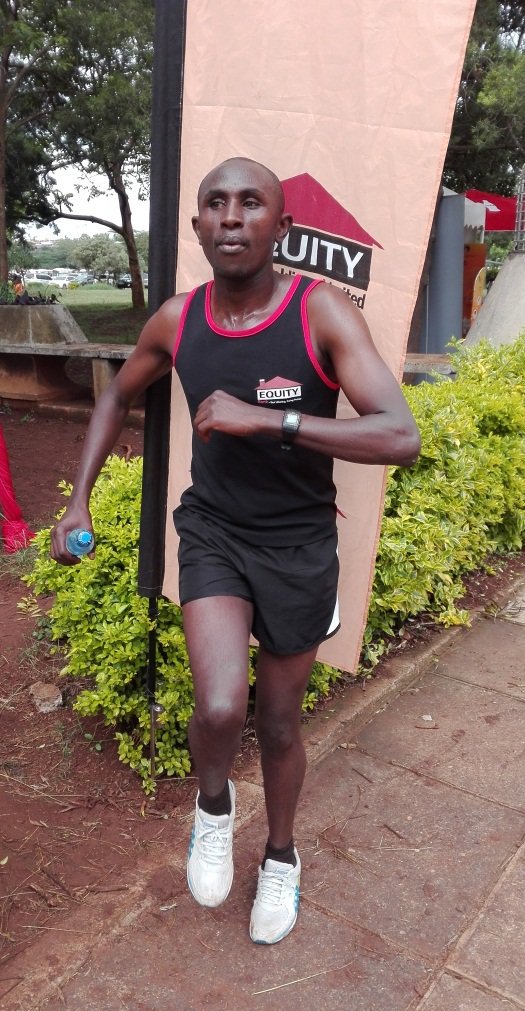 KeEquityBank's tweet image. George Wairimu who took second place warming up before the run #KarenHeartRun