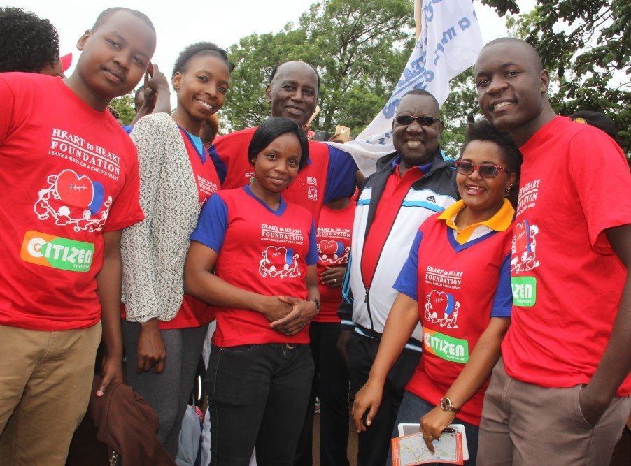 KeEquityBank's tweet image. Equity Bank staff members pose for a photo with the Karen Hospital Director Dr. Dan Gikonyo before the #KarenHeartRun
