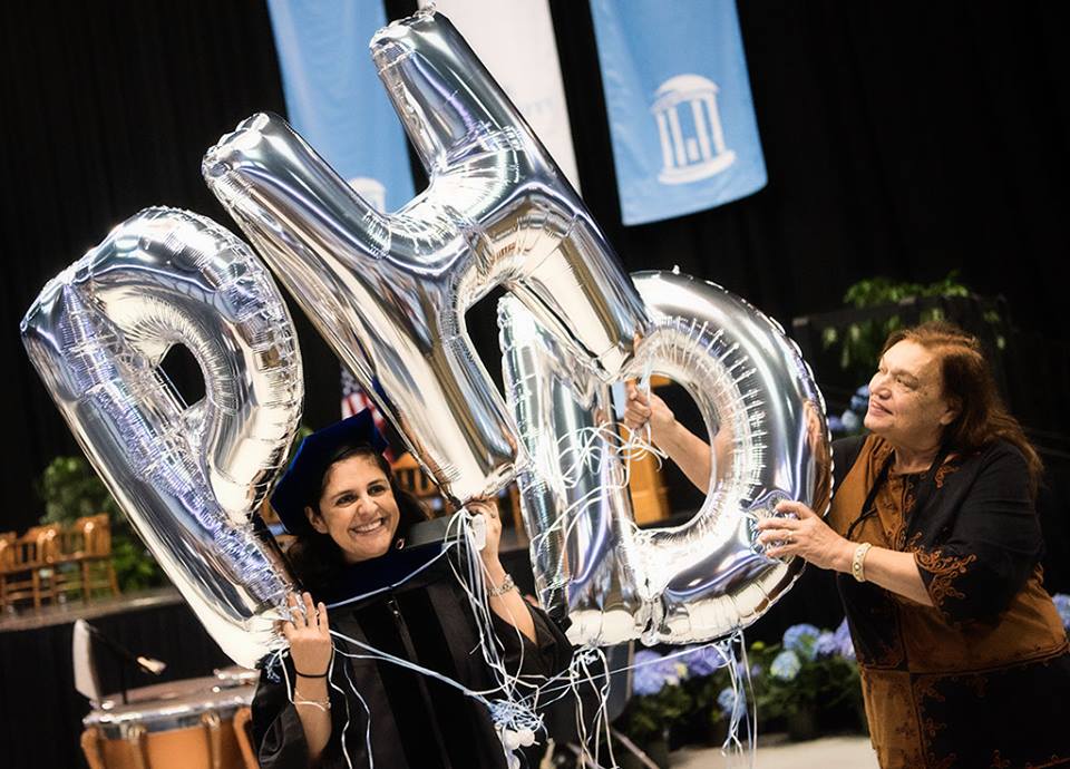UNC_GradSchool's tweet photo. More photos from this weekend's #UNC Doctoral Hooding Ceremony have just been added to our Facebook page! #UNCgrad https://t.co/g2N3v85r04 https://t.co/Zt10x5PXVx