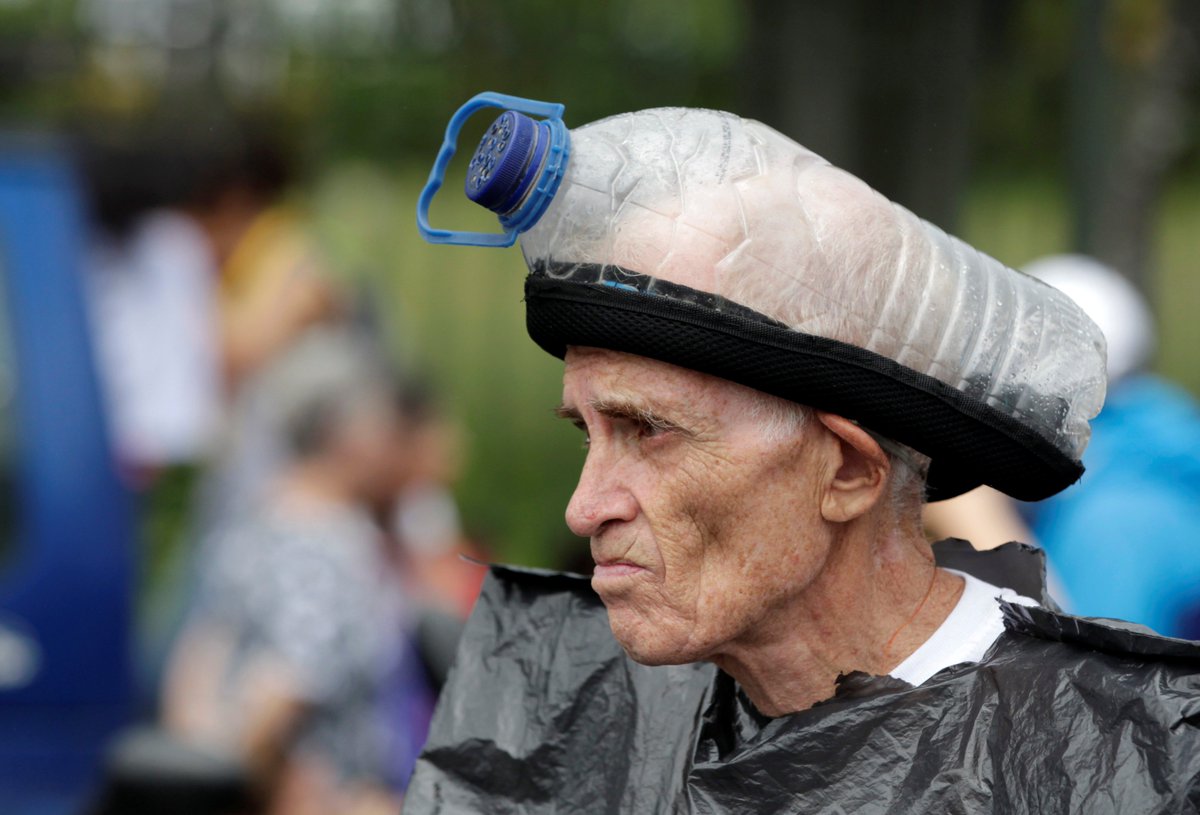 instantmatch's tweet image. An opposition supporter with a home-made gas mask during a blockade in #Caracas, #Venezuela May 15, 2017.  @ChristianVeron @reuterspictures