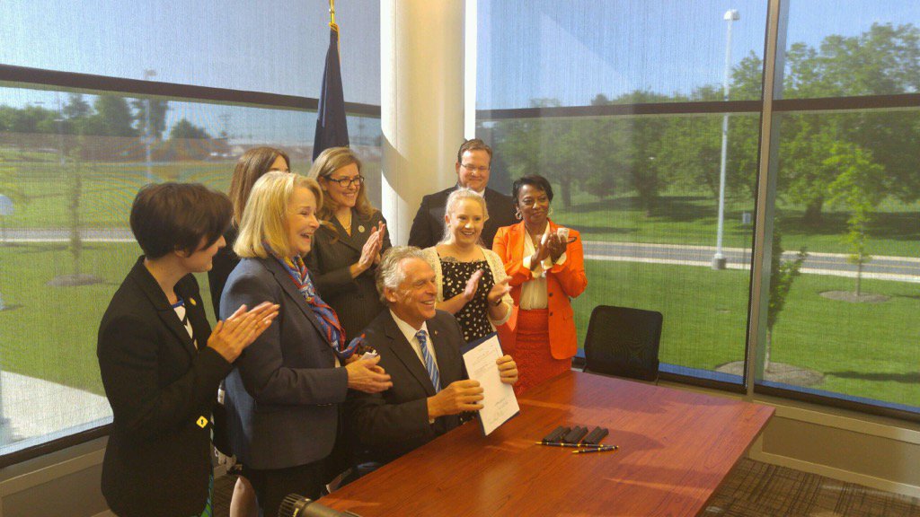 TerryMcAuliffe's tweet photo. Just signed: bill that protects our college students from being ripped off... you learn in VA we'll protect you https://t.co/hp0VFEoRcV